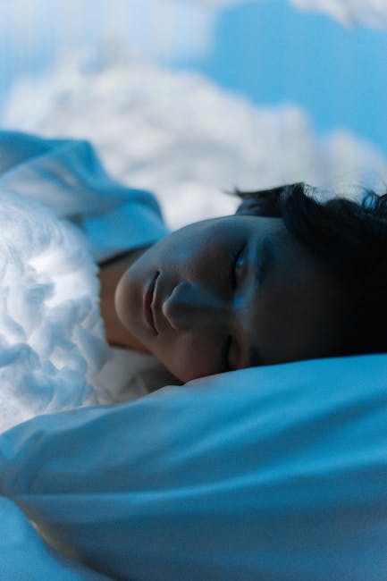 Serene image of a woman sleeping on a cloud-like bed, capturing tranquility and peace.